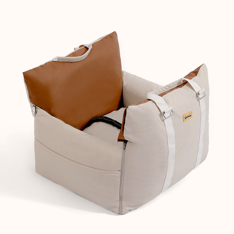 Beige faux leather waterproof dog car seat bed with brown cushioned backrest and adjustable straps, designed for pet comfort .