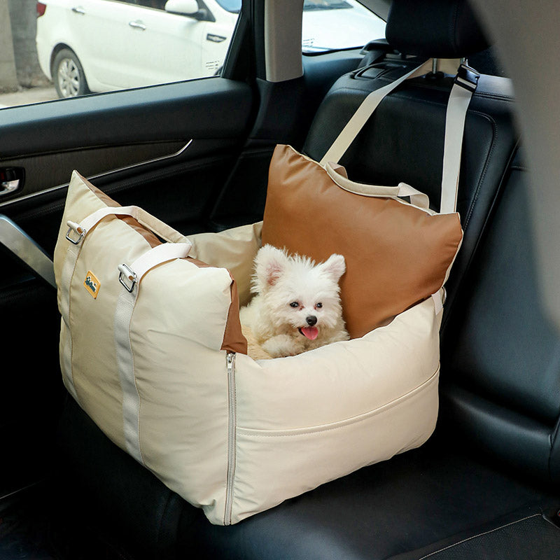 Beige faux leather waterproof dog car seat bed with high sides and safety straps, ideal as a cat tower or scratcher.