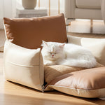 Beige faux leather 3-in-1 cat tower for large cat with cushioned bed and built-in scratcher cat condos.