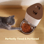 Automatic pet feeder shown from the side with triangular corner-fit design