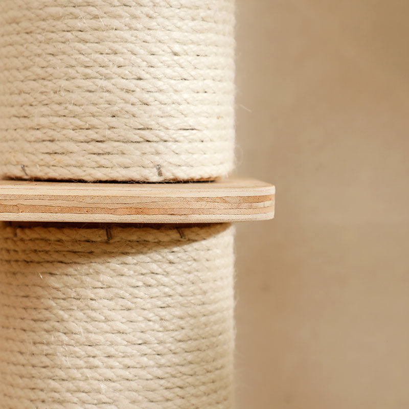 Close-up of natural birch wooden shelf attached to thick sisal-wrapped scratching post on cat tree tower