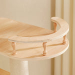 Curved birch wooden guardrail attached to platform on luxury cat tree with natural finish and light wood tones