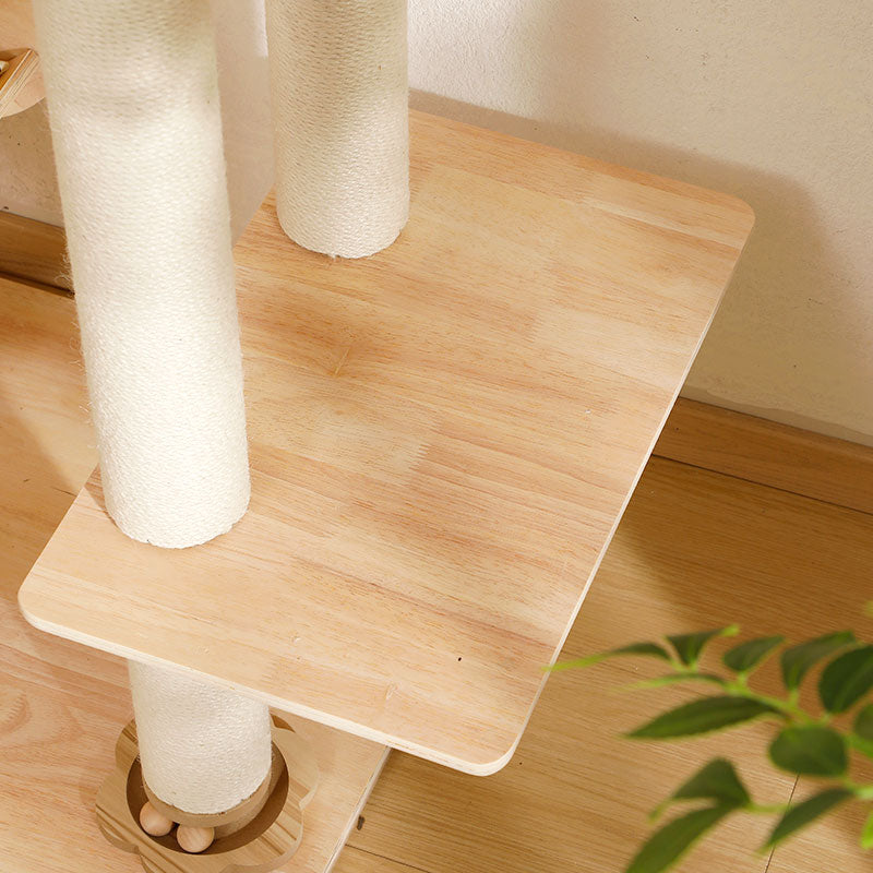 Natural birch wooden platform with rounded edges and thick sisal-covered scratching posts on cat tree base