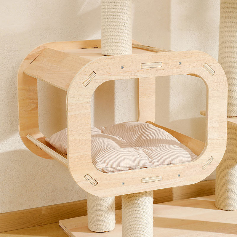 Birch wooden cubby with cushioned beige corduroy bed and sisal-wrapped posts on luxury 180cm cat tree tower