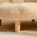 Beige bouclé fabric pet couch bed corner with light wooden leg, part of cat tower for large cat and cat condos with.