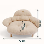 Beige bouclé XL pet couch bed with rounded arms and backrest, wooden legs, soft plush surface, ideal cat tower for large cat .